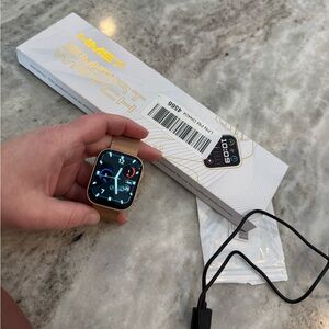 🌀Generic Smartwatch - Elegant Gold Finish with charger! Gently used.